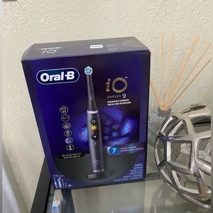 Oral-B iO Series 9 Electric Toothbrush with 4 Brush Heads, Black & Rose Pink